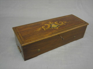 A Victorian cylinder musical box by Nicole Freres of Geneva contained in an inlaid rosewood case (19 teeth missing)
