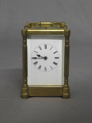 A 19th Century French 8 day repeating striking carriage clock with enamelled dial