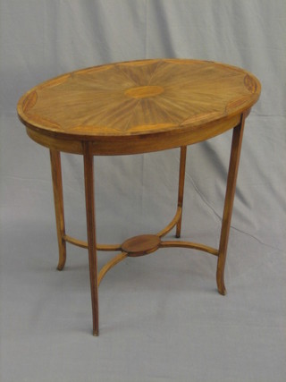 An Edwardian Georgian style oval mahogany occasional table, inlaid satin and ebony stringing, raised on splayed feet with undertier 28" 