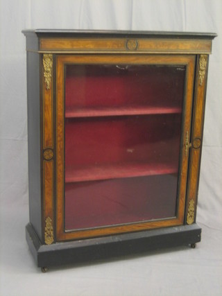 A Victorian ebonised and walnut Pier cabinet with gilt metal mounts, raised on a platform base 31"