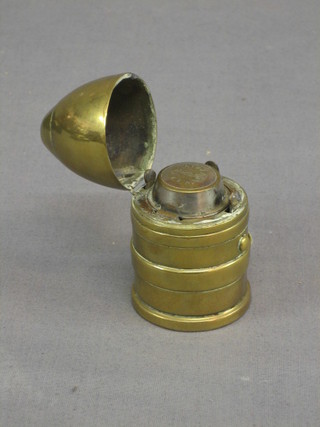 A Trench Art inkwell formed from a  nose cone of a shell 3"