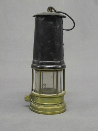 A 19th Century metal and brass miner's safety lamp