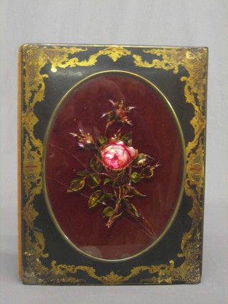 A Victorian papier mache blotter, the centre section with oval glass panel decorated roses 13" (f to the centre)