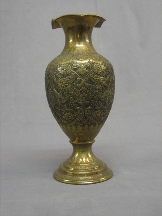 A 20th Century Persian brass club shaped vase decorated birds amidst branches 12"