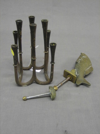 A bronzed 10 light candelabrum together with a brass door knocker in the form of a fish