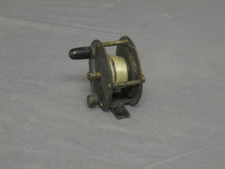 A brass centre pin fishing reel by Alcocks 2 1/2"