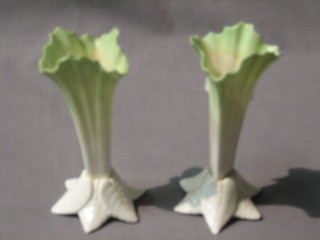 A pair of Worcester Royal Chinaworks green glazed vases in the form of petals 5", raised on petal base