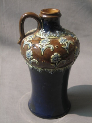 A Doulton Lambeth blue and brown salt glazed flagon, the base marked Doulton England 1148, 9"