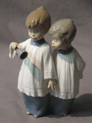 A Nao figure of 2 standing Altar boys with bell 6"
