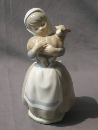 A Nao figure of a standing girl with lamb 9"