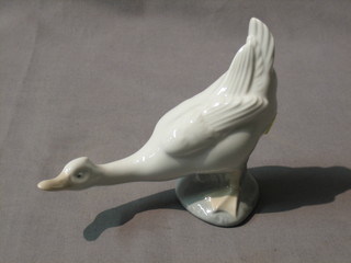 A Nao figure of a crouching goose 6"