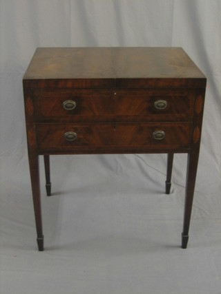 A Georgian mahogany enclosed wash stand, the interior fitted a mirror and various compartments, the base fitted 1 long drawer, raised on square tapering supports ending in spade feet 27"