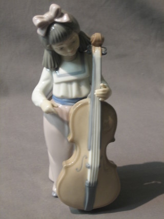 A Nao figure of a standing girl with Cello 8"