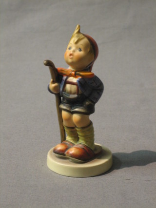 A Goebel figure of a boy standing with a stick (f and r), base marked 16, 4"