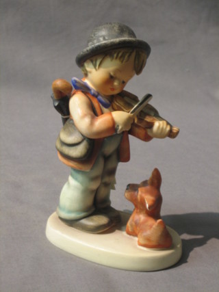 A Goebel figure of a standing boy with violin and seated dog 5"