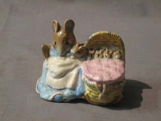 A Beswick Beatrix Potter figure Hunca Munca, brown mark 1951 