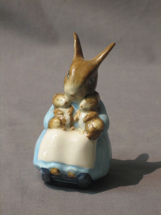 A Beswick Beatrix Potter figure Mrs Rabbit and Bunnies, brown mark 1976