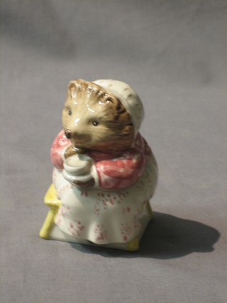 A Beswick Royal Doulton Beatrix Potter figure Mrs Tiggywinkle Taking Tea, brown mark 1989