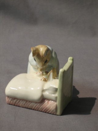A Beswick Royal Doulton Beatrix Potter figure Peter in Bed