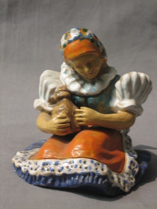 An Art Deco Chechoslovakian figure of a crouching girl with bottle 4"