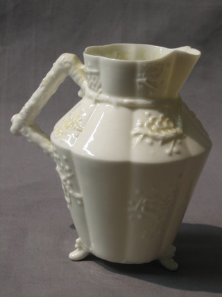 A white glazed Beleek jug, the base with black Beleek mark and lozenge registration mark 5" (hairline crack)