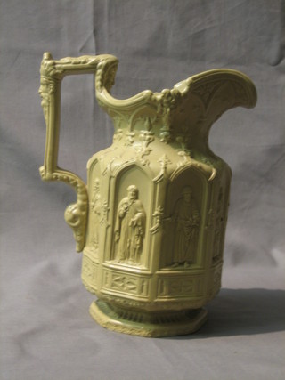 A Victorian stoneware jug decorated religious figures, raised on an octagonal base 9"