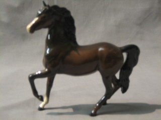 A Royal Doulton figure of a standing bay horse 7"