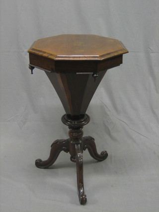 A Victorian octagonal rosewood work table of conical form, raised on pillar and tripod supports 17 1/2" (some beading missing)