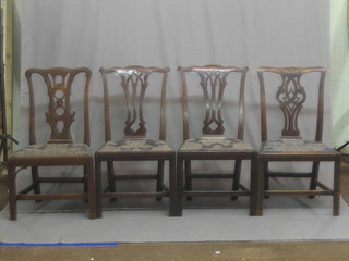 A pair of Georgian style chairs and 2 other Chippendale style chairs with splat backs and upholstered drop in seats, raised on square tapering supports