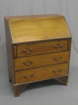 An Edwardian inlaid mahogany bureau with fall front revealing a well fitted interior above 3 long drawers raised on bracket feet, 20"