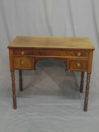 A Georgian mahogany side table fitted 1 long drawer above 2 short drawers, raised on turned supports 36"