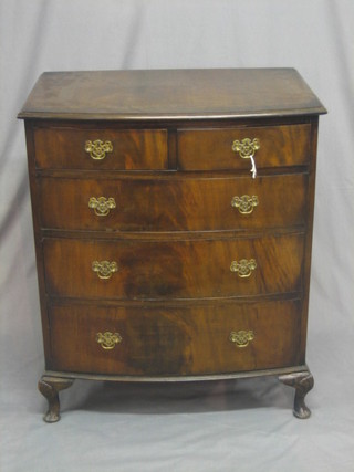 A 1920's Queen Anne style bow front chest of 2 short and 3 long drawers with crossbanded top, raised on cabriole supports 29"