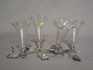 A silver plated epergne of floral form with 4 glass vases