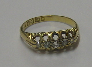 A lady's 18ct gold dress ring set 5 diamonds