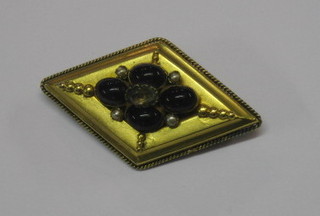 A 19th Century pinch beck mourning brooch set coloured stones, the reverse with hair sculpture