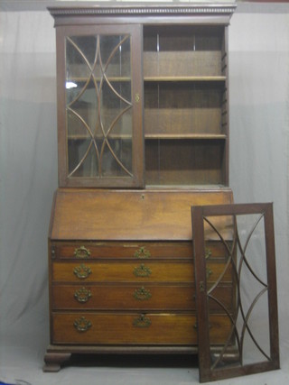 A Georgian mahogany bureau bookcase, the upper section with moulded and dentil cornice, the interior fitted adjustable shelves enclosed by astragal glazed panelled doors, the base fitted 4 long drawers with brass swan neck drop handles, raised on ogee bracket feet 44" (requires some attention)