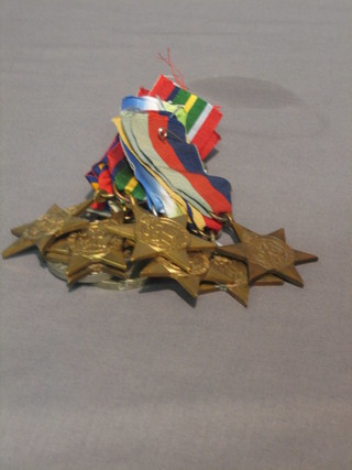 9 WWII medals comprising 1939-45 Star, Africa Star, Atlantic Star, Pacific Star, Burma Star, Italy Star, France & Germany Star, Defence and War Medal