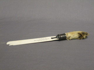 A Victorian newspaper opener with ivory blade, the handle in the form of a hare's foot, the 7" blade marked Killed at Bashurst Itchingfield 28 March 1885 (cracked and chipped to blade)