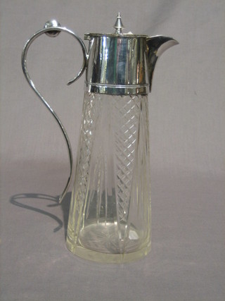 An Edwardian cut glass claret jug with silver plated mounts