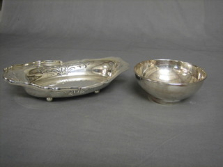 A circular silver plated bowl marked Benson 6" and an oval cake basket 10"