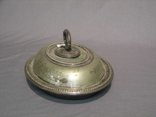 An oval silver plated entree dish and cover with bead work border
