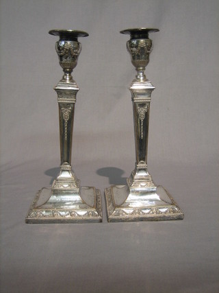 A pair of Adam style silver plated candlesticks with detachable sconces, 12"