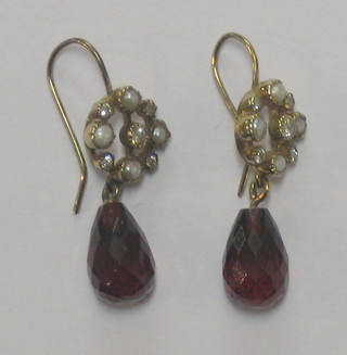 A pair of garnet and pearl drop earrings