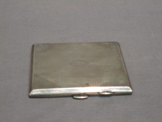 An Art Deco silver cigarette case with engine turned decoration, Birmingham 1929, 4 ozs