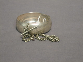 A silver curb link watch chain together with a silver bracelet