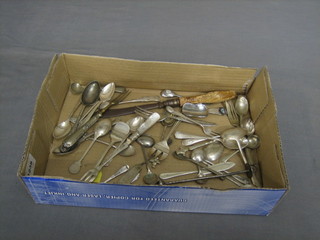 A collection of silver plated flatware