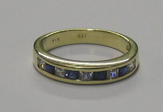 A 14ct gold half eternity ring set sapphires and diamonds