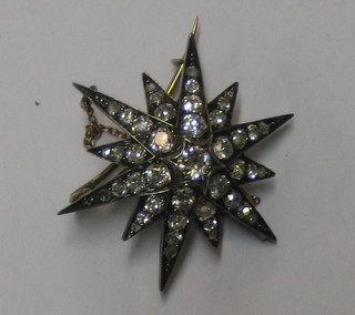 A handsome star brooch set diamonds