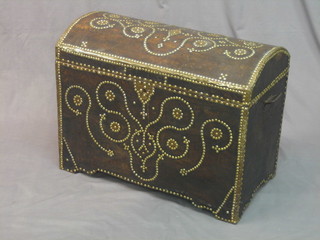 A 19th/20th Century pine leather covered domed trunk with stud decoration 31"
