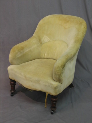 A Victorian mahogany framed tub back chair upholstered in yellow material